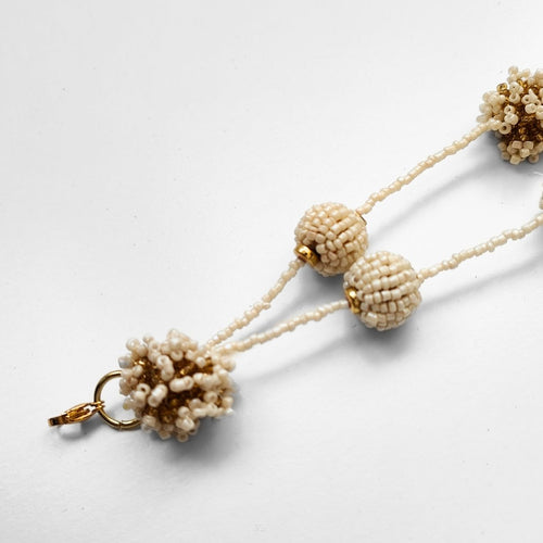 BIG BEIGE POMPON NECKLACE