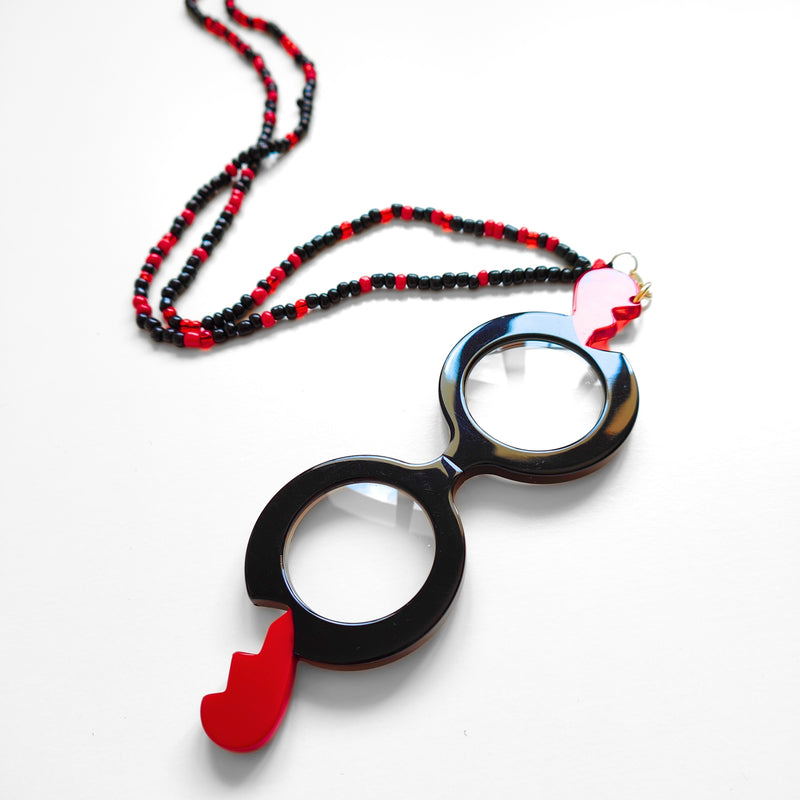 COLGANTE-GAFAS CORAZON PARTÍO ROJO - EDICIÓN 15 AÑOS