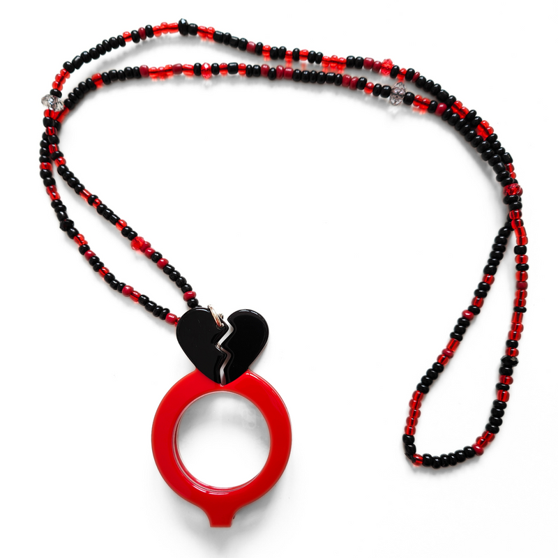 COLGANTE-GAFAS CORAZON PARTÍO NEGRO - EDICIÓN 15 AÑOS