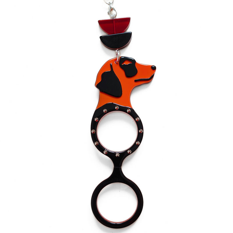 COLGANTE-GAFAS PERRO PUNK NARANJA - EDICIÓN 15 AÑOS