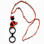 COLGANTE-GAFAS PERRO PUNK NARANJA - EDICIÓN 15 AÑOS