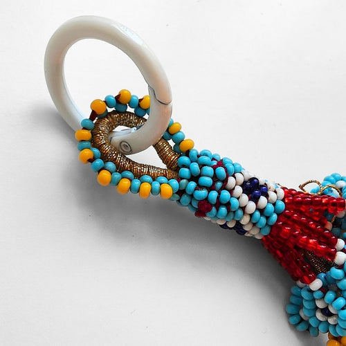 TURQUOISE-RED POMPON BAG CHARM